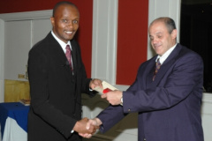noel-fernandes-accepts-gold-medal