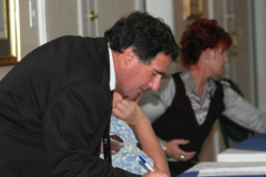 signing-in-at-the-agm